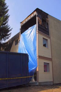 Vertical view of a third story apartment destroyed by fire.