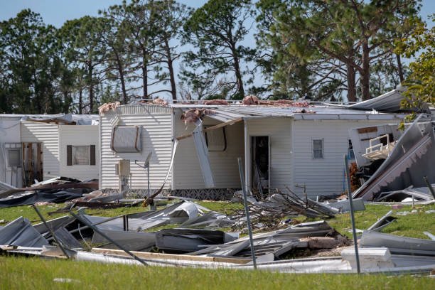 A hurricane-damaged mobile home in Florida, highlighting the need for storm damage restoration efforts.