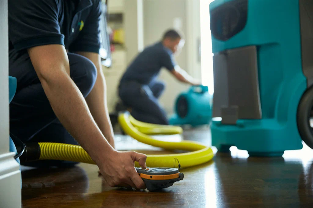 Emergency water removal process with professional drying tools