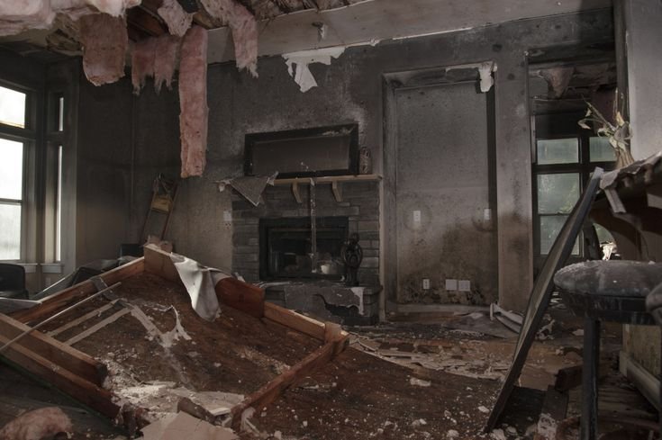Fire Damage Restoration Service cleaning smoke damaged living room in San Diego home
