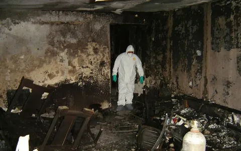 Smoke affected home undergoing Fire Damage Restoration Service with professional equipment